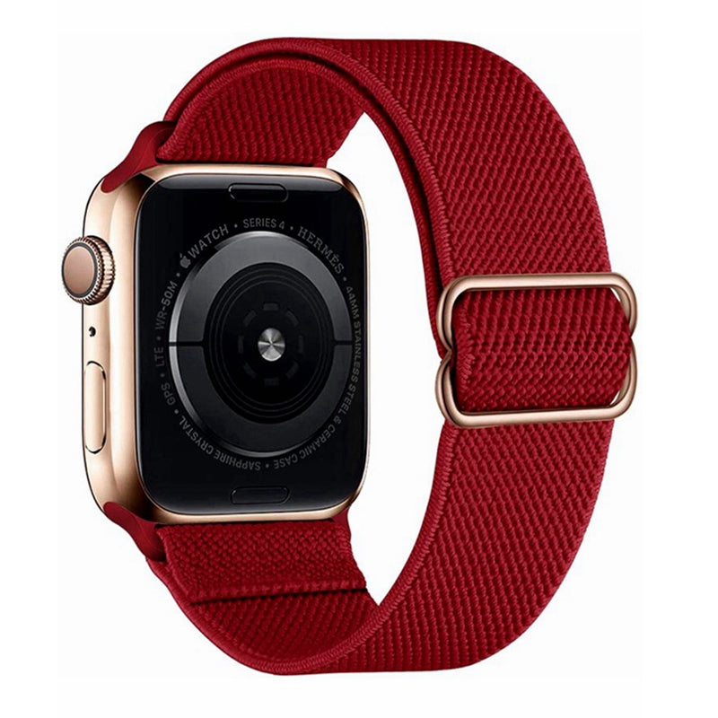 Gold stainless steel smartwatch with red woven elastic loop band and magnetic clasp closure