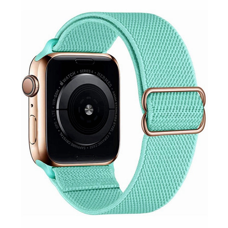 Gold stainless steel smartwatch with mint green woven elastic loop band and rose gold buckle