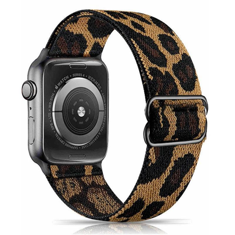 Leopard print woven elastic smartwatch band compatible with Apple Watch, black and tan animal pattern with metal slider closure