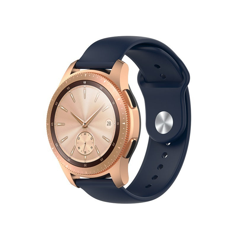 Rose gold smartwatch with dark navy silicone loop band and quick release mechanism