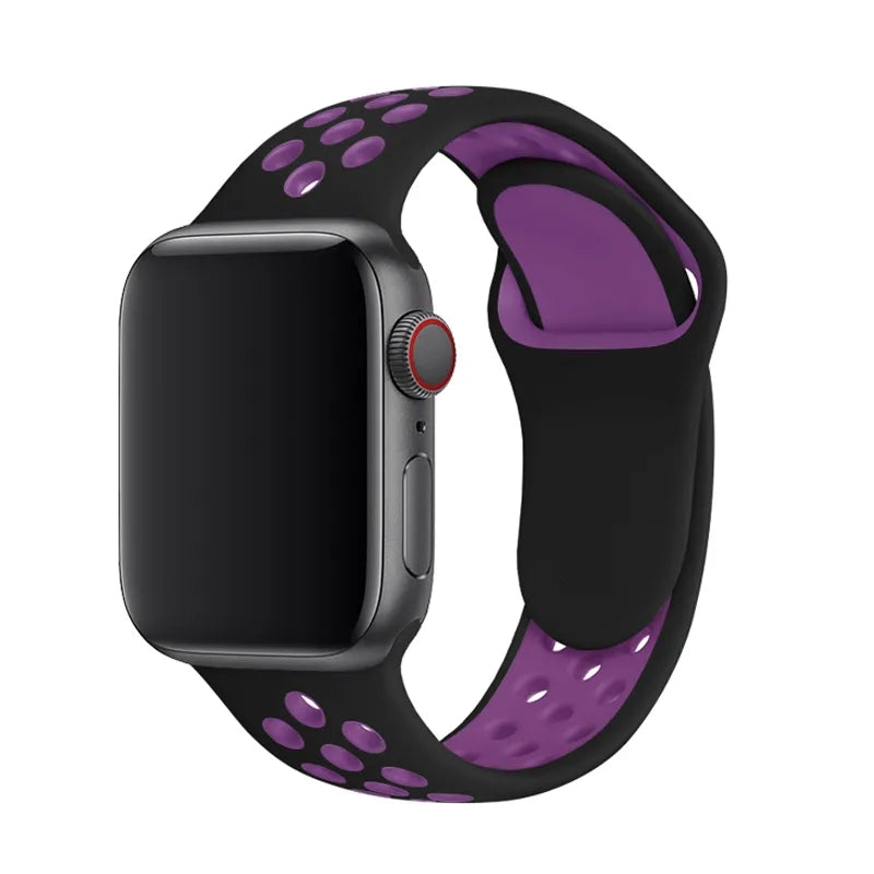 Black and purple silicone sports band for Apple Watch with ventilation holes and cellular model watch face display
