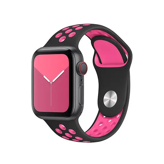 Black and pink silicone sports band for Apple Watch with perforated ventilation holes and digital watch face displaying time