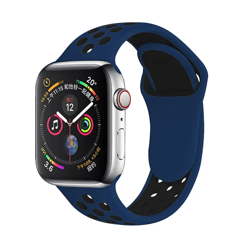 Apple Watch Series 4 silver stainless steel case with navy blue and black perforated sports silicone band