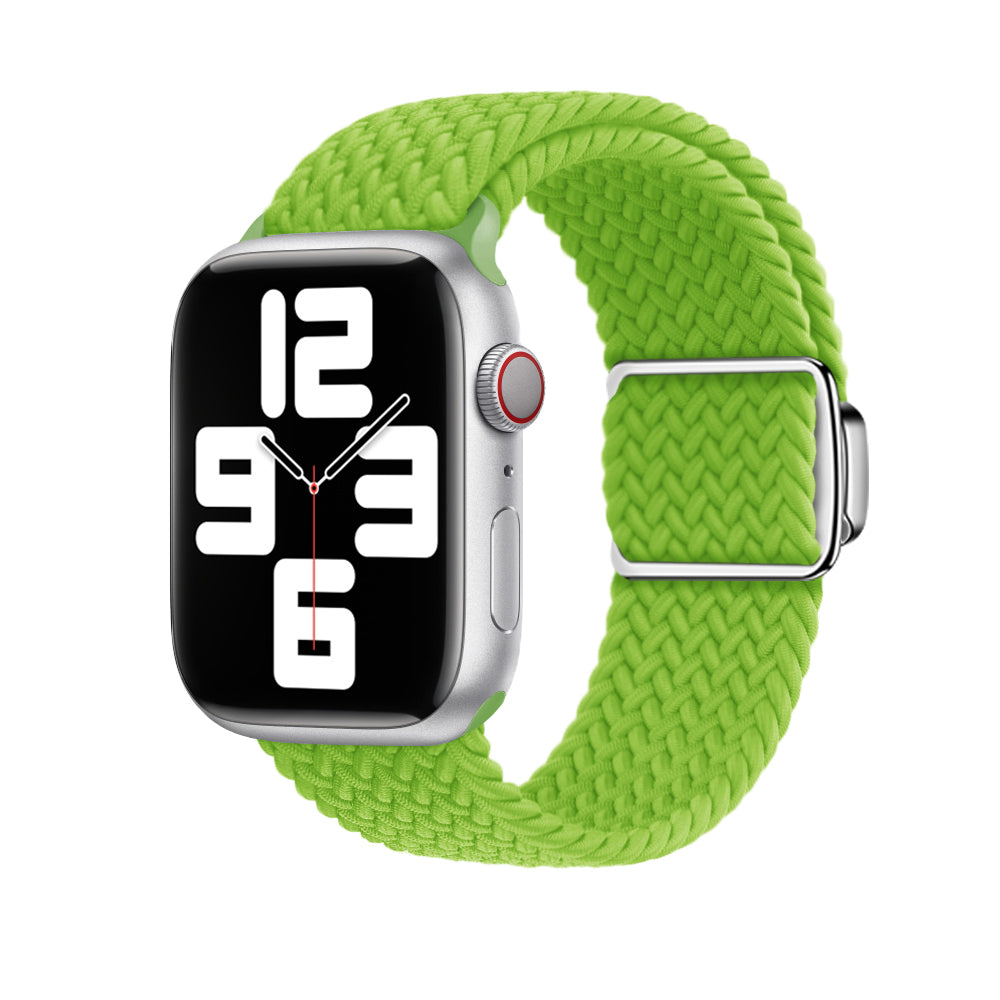 Silver smartwatch with bright green braided fabric band and magnetic clasp, displaying time on black digital face