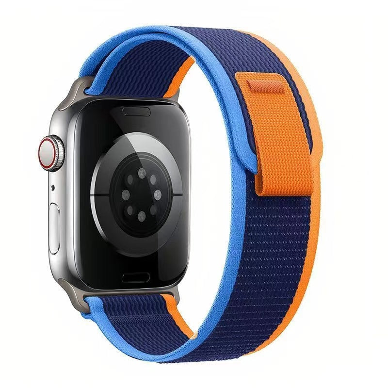 Colorful nylon loop band for Apple Watch with blue, navy, and orange woven fabric design and adjustable velcro closure