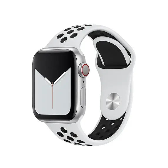 Silver Apple Watch with white and black sports silicone band featuring perforated design and digital crown