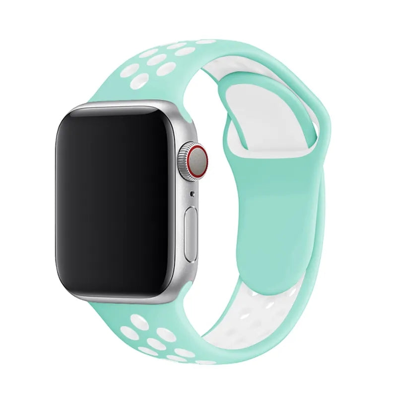 Silver smartwatch with mint green and white perforated sports silicone band