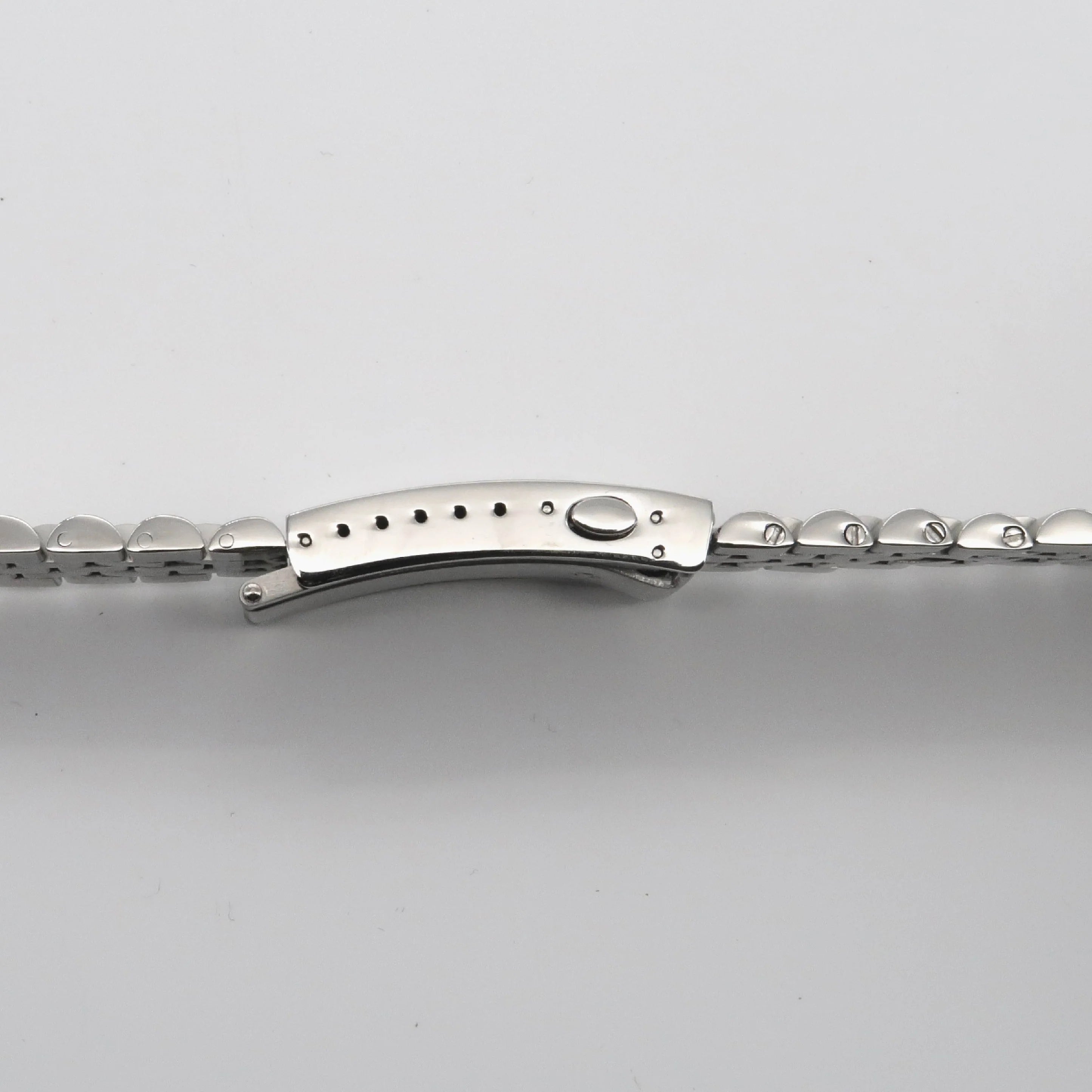 Silver stainless steel watch bracelet end link with curved clasp and hole details for Seiko SKX and Seiko 5 Sport models