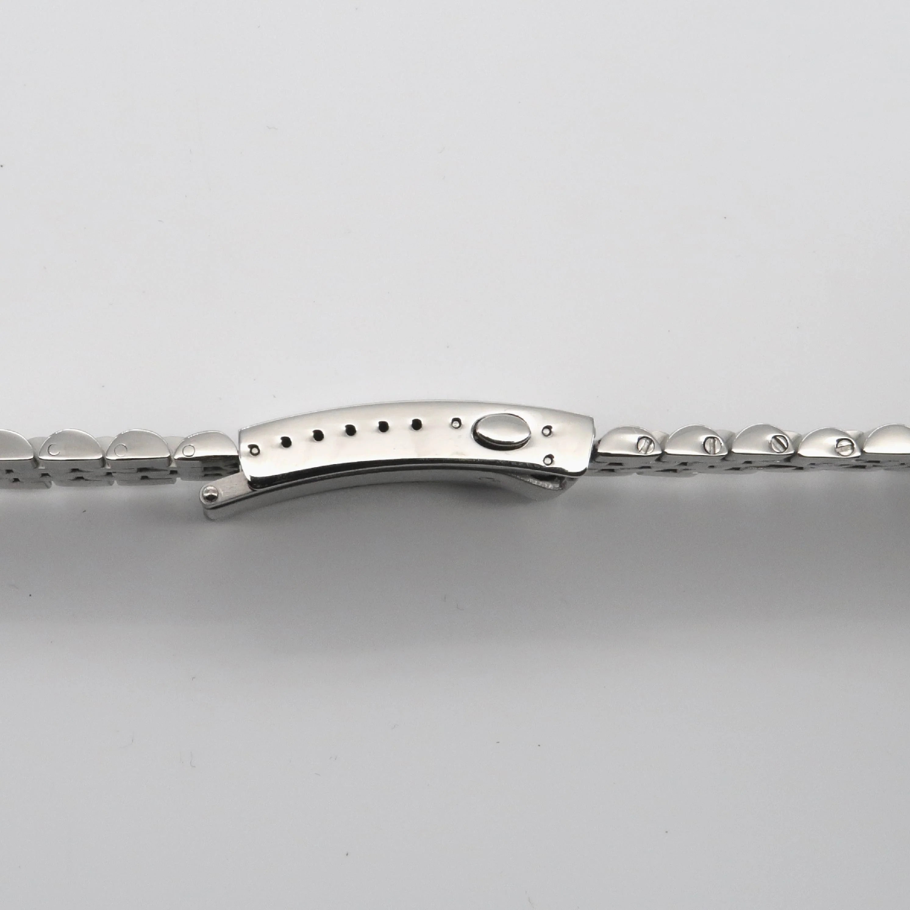 Silver stainless steel curved watch bracelet end link with perforated detail and polished finish, compatible with Tudor Black Bay Pro models