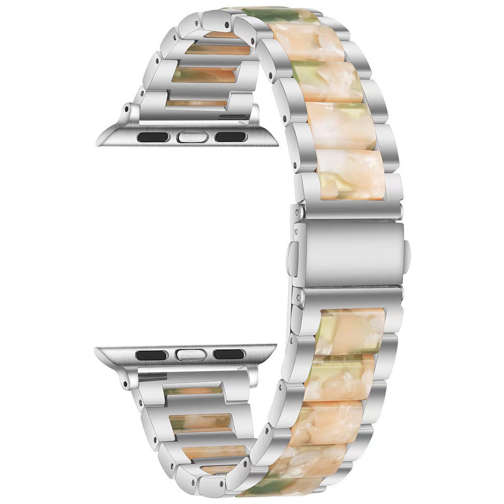 Silver stainless steel Apple Watch band with pearlescent shell and metal links in white and champagne tones