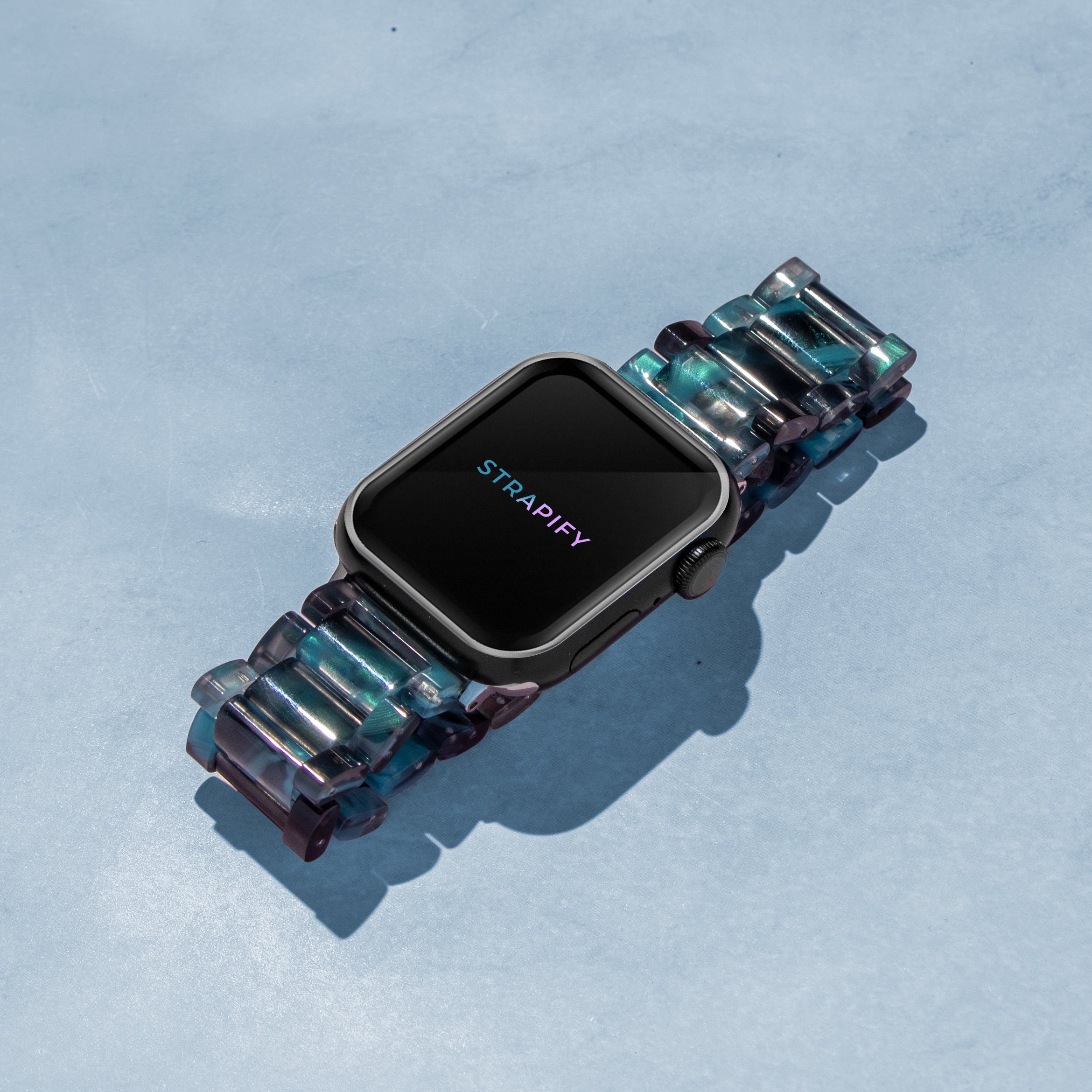 Strapify blue galaxy crystalised acetate smartwatch band with square watch face on light blue background