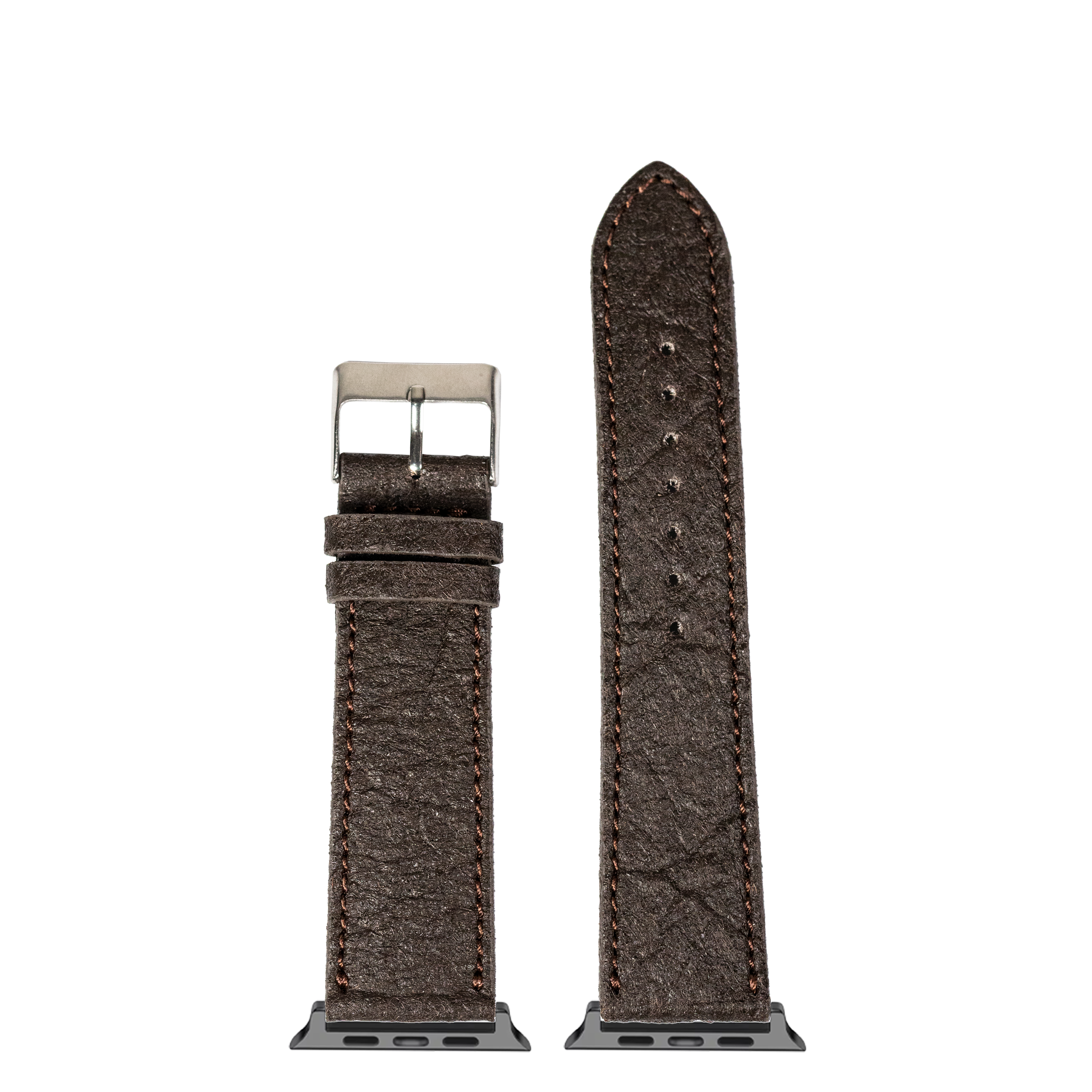 Dark brown vegan leather Apple Watch band with pineapple texture, shown with silver buckle and connector lugs for smart watch