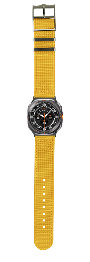 Military watch with black dial, orange accents, and mustard yellow tactical fabric strap with adjustment holes