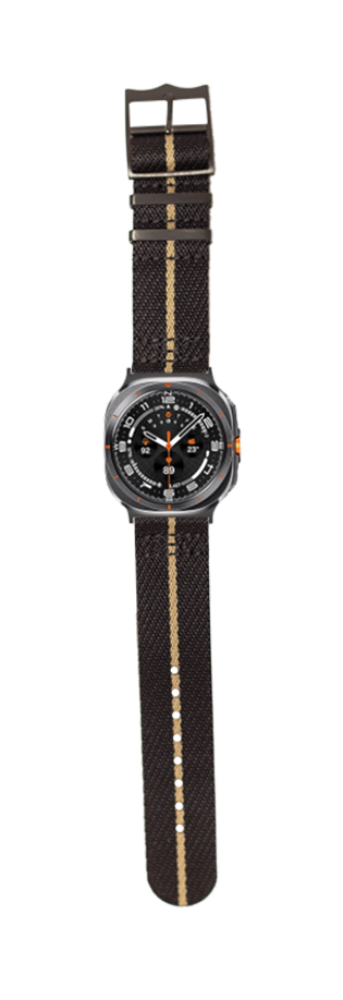 Black tactical watch with steel case and orange accents on black fabric strap with tan stripe, military-style design