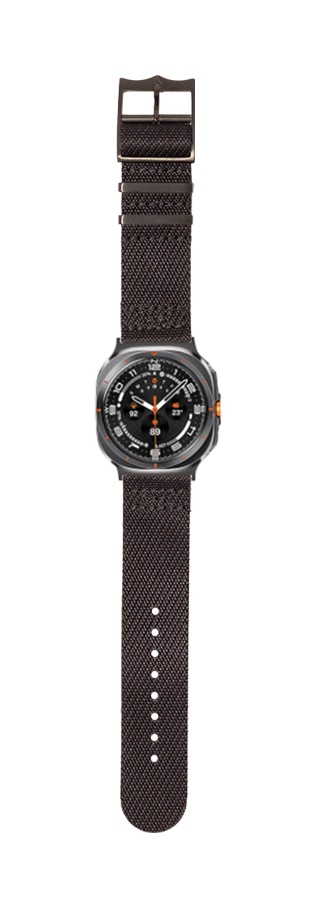 Black tactical watch with military-style dial, orange accents, and black fabric strap with hardware