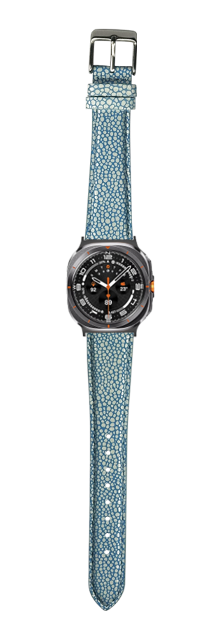 Blue faux stingray leather watch strap with gunmetal case and black dial featuring orange accents