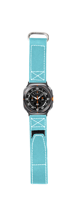 Galaxy Watch smartwatch with turquoise military-style fabric band featuring white stitching and velcro closure, black dial with orange accents