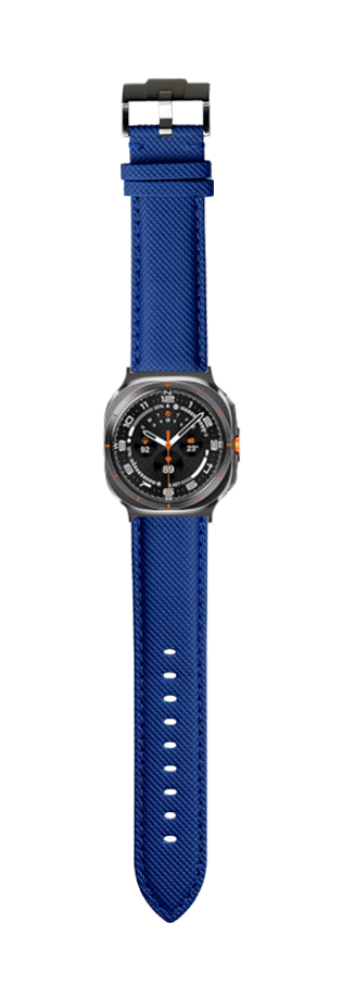 Electric blue sailcloth watch band with black case and dark dial face, featuring orange accents and adjustable strap with pin holes