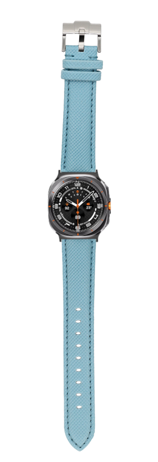 Sky blue sailcloth watch band with black chronograph face and orange accents, stainless steel buckle