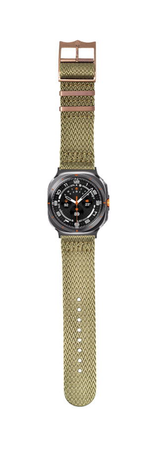Square face tactical watch with olive green fabric band and bronze hardware on white background