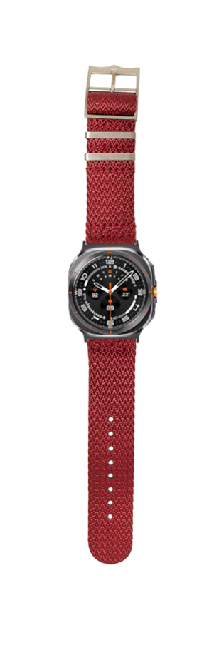 Black sport watch with red militex fabric strap and orange accents, featuring bold dial design