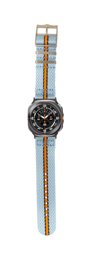 Galaxy Watch 8 Ultra smartwatch with sky blue Sharktooth Militex strap, black dial, orange accent stripe and wood buckle