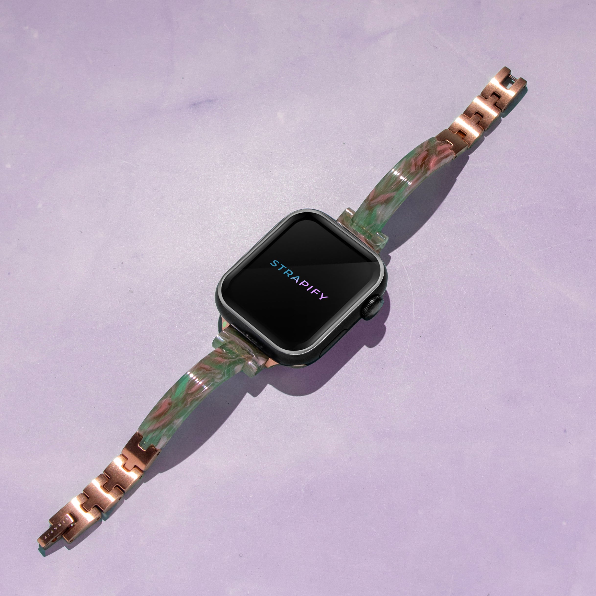 Strapify acetate bangle smartwatch band in jade pearl with rose gold hardware on square-face Apple Watch