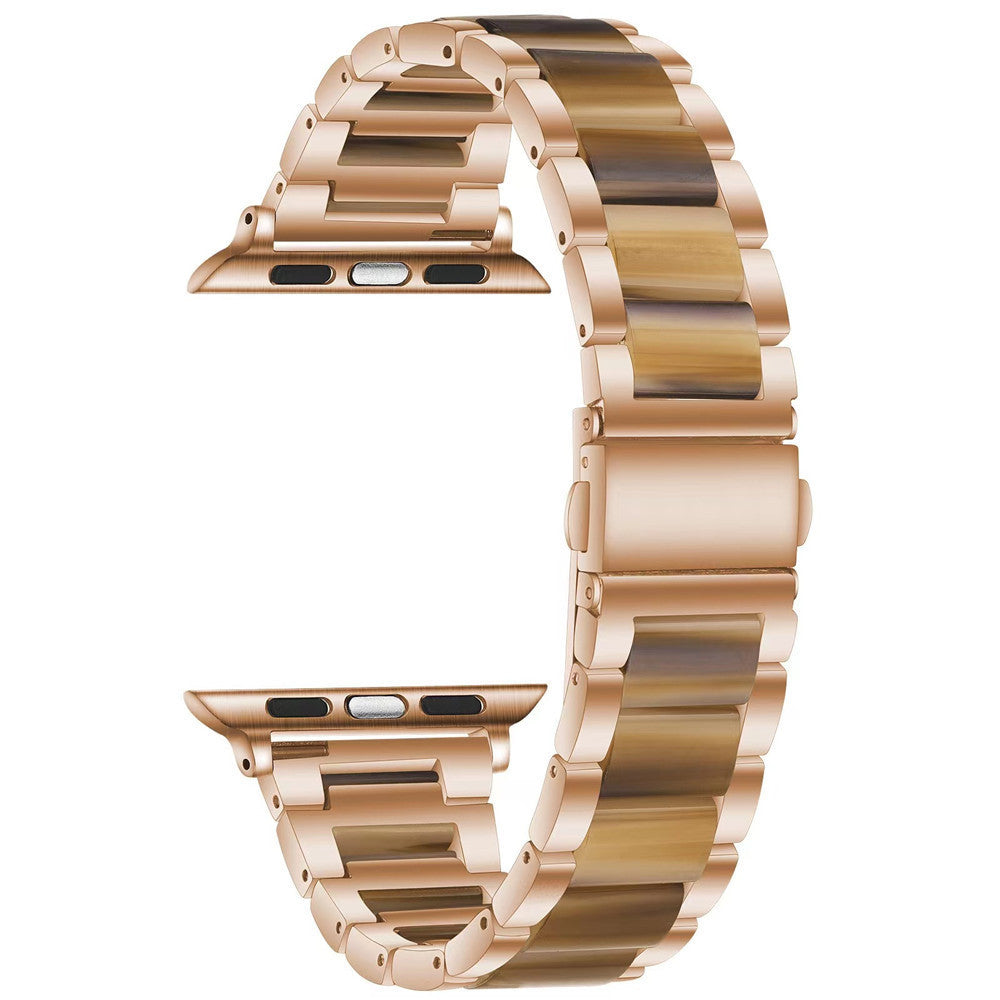Rose gold stainless steel smartwatch band with pearlescent resin links and metal connectors for Apple Watch