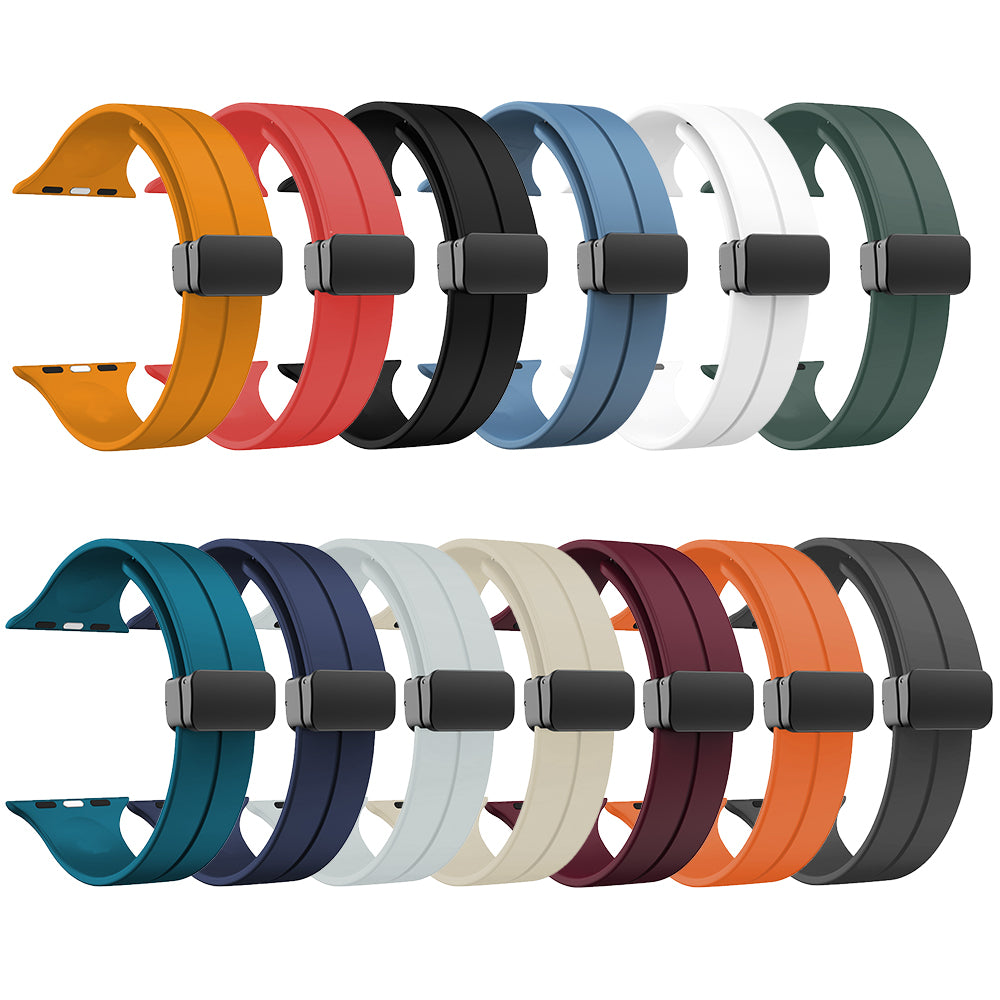 Silicone Apple Watch bands in multiple colors including orange, red, black, blue, white, green, teal, navy, beige, maroon and charcoal with black magnetic clasps