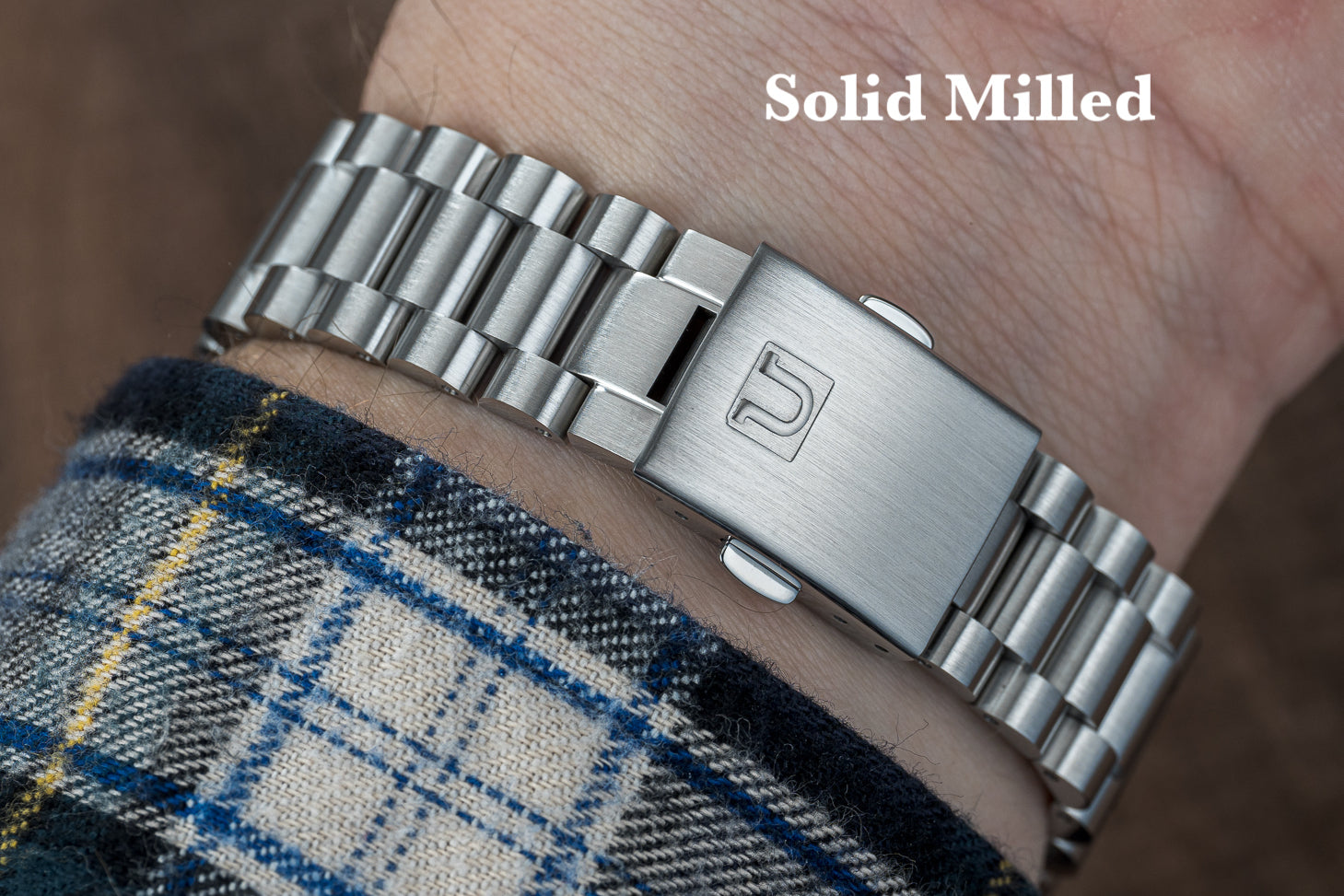 Solid milled stainless steel bracelet for Seiko SARB017 watch with brushed finish and secure clasp on wrist