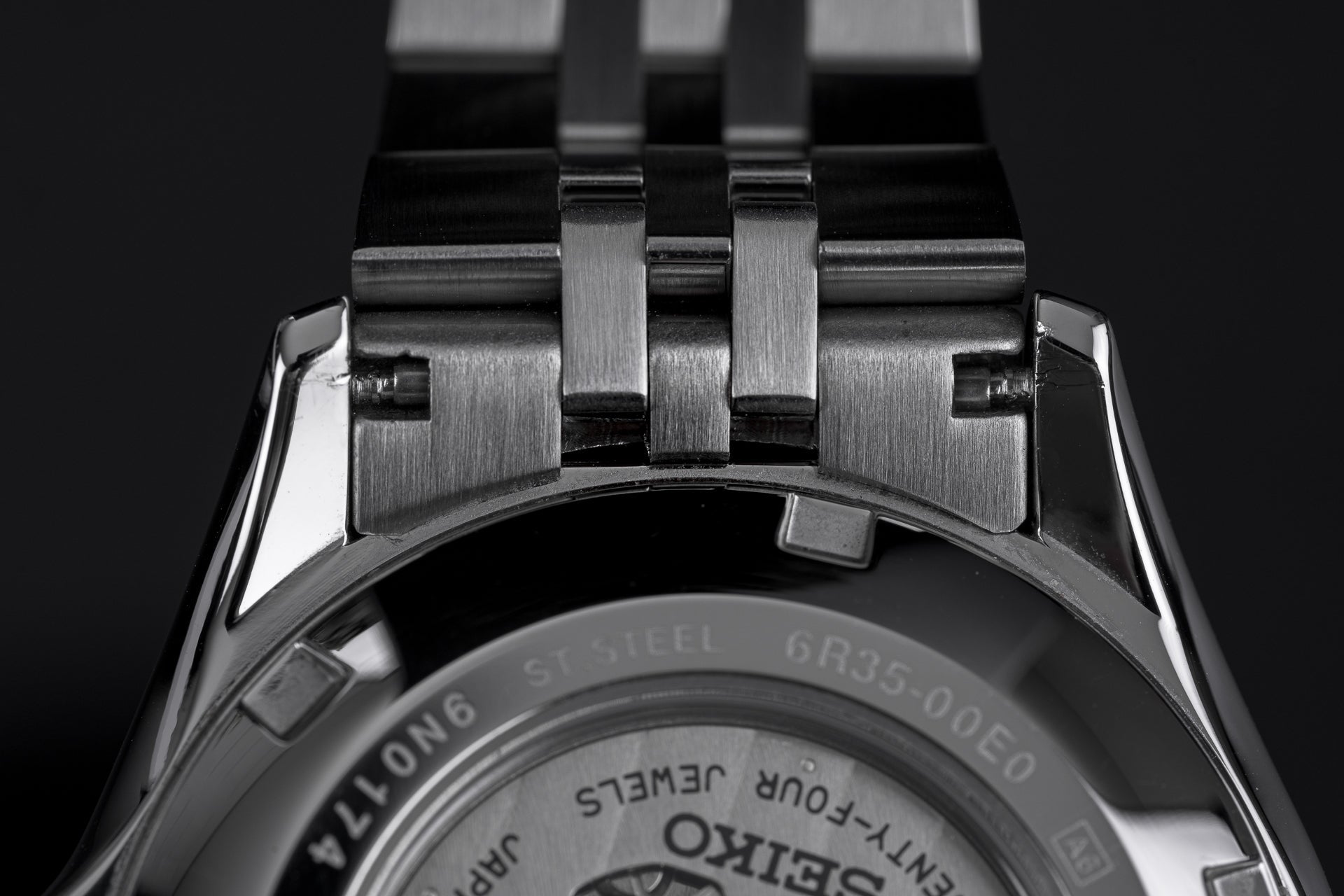 Stainless steel bracelet for Seiko SRPE watch with brushed metal links and secure clasp closure