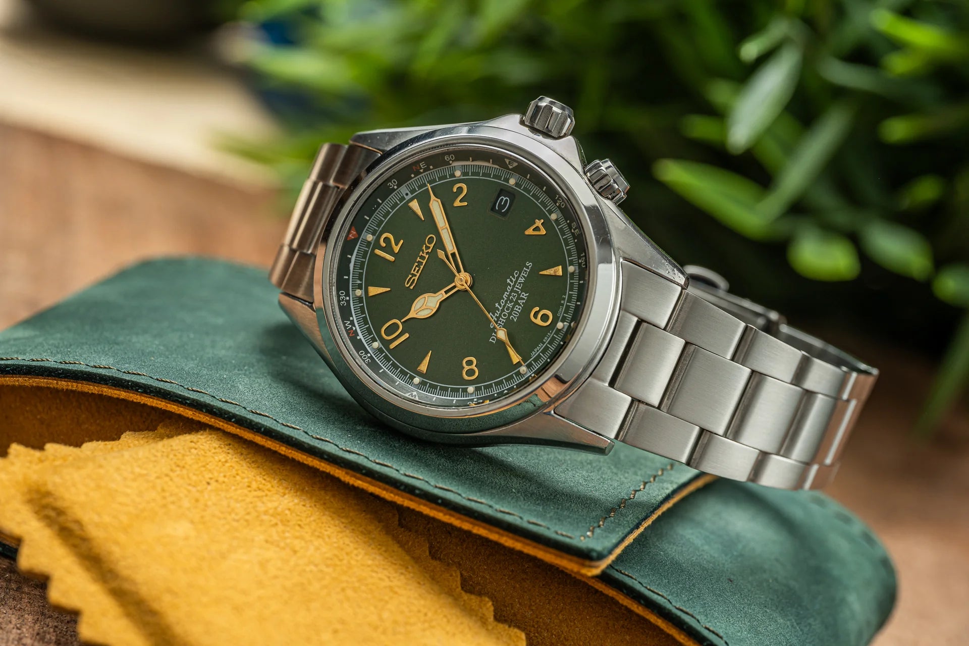 Seiko SARB017 stainless steel chronograph watch with green dial and gold indices on leather strap