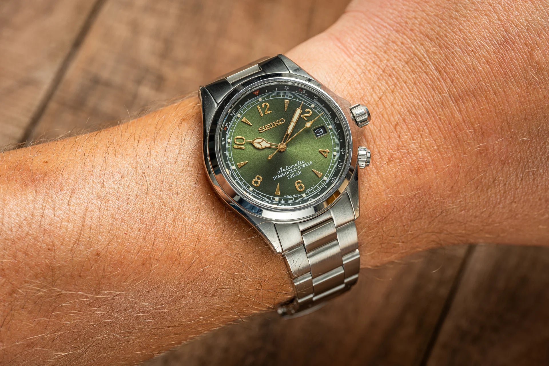 Seiko SARB017 Prospex automatic watch with green dial and stainless steel bracelet on wrist