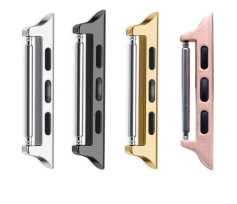 Four Apple Watch velcro sport bands in silver, black, gold, and pink displayed side by side showing connector hardware
