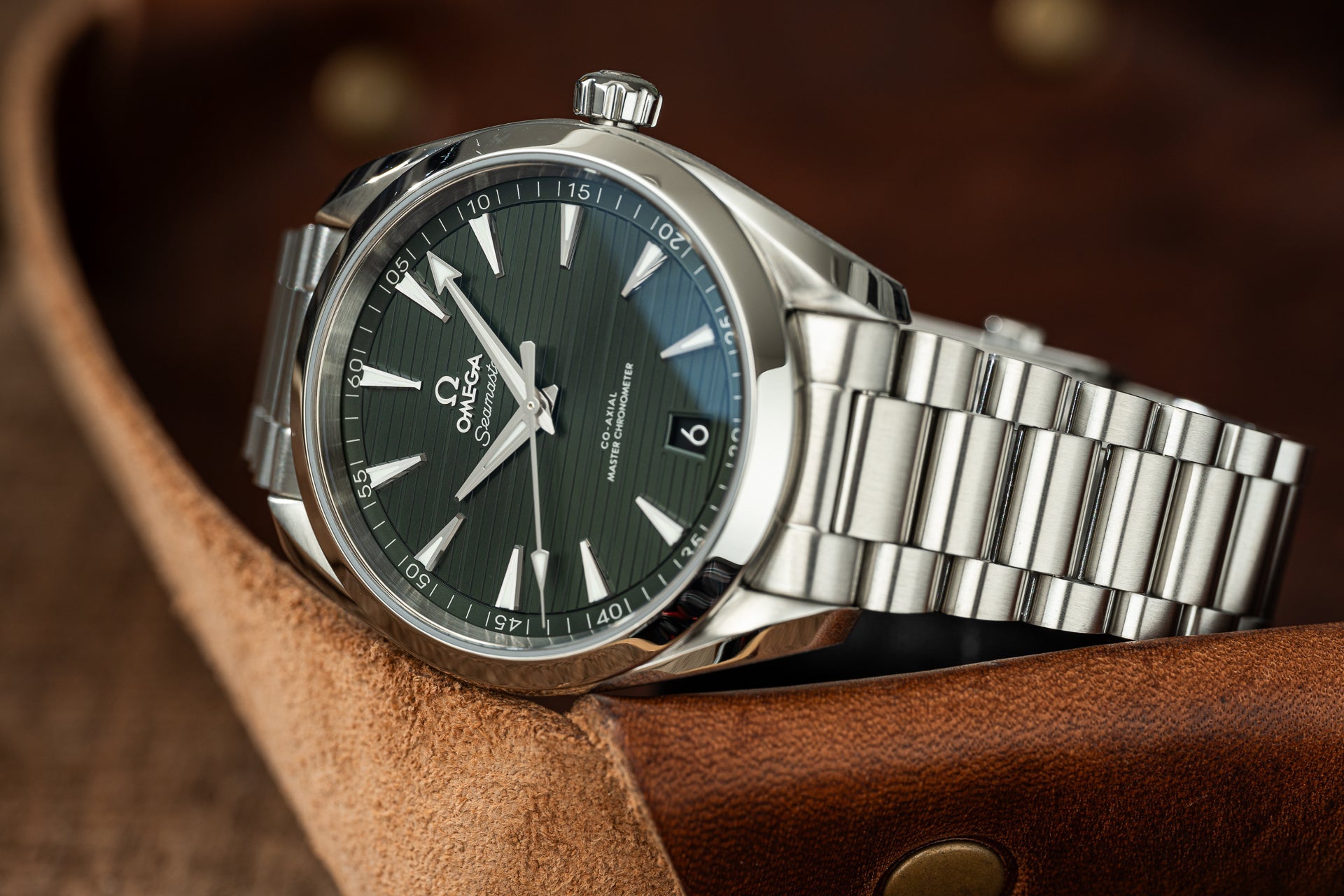 Omega Seamaster Aqua Terra 41mm stainless steel watch with black dial and matching bracelet on brown leather strap