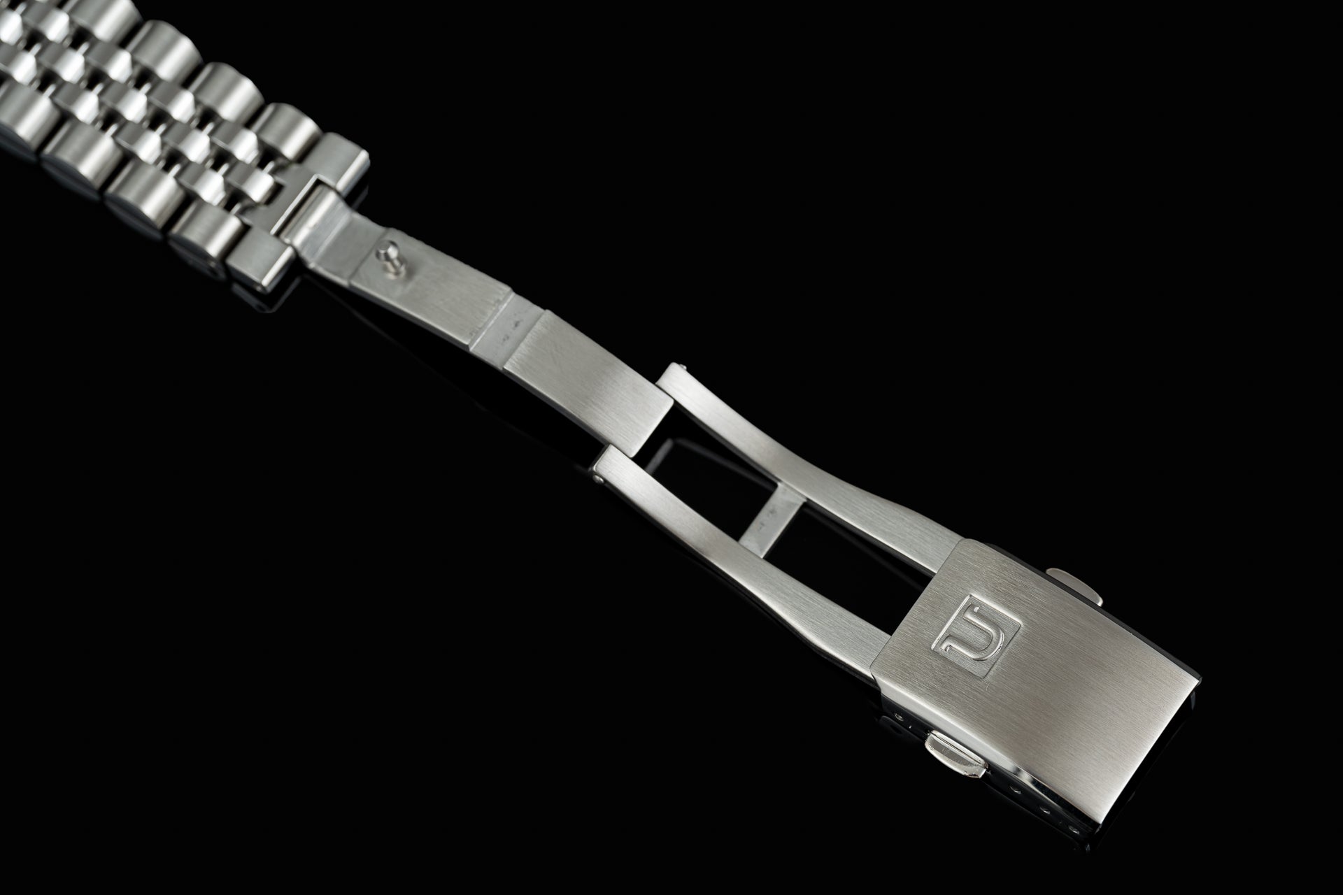 Stainless steel watch bracelet with solid links and deployant clasp for Tudor Black Bay 54 timepiece