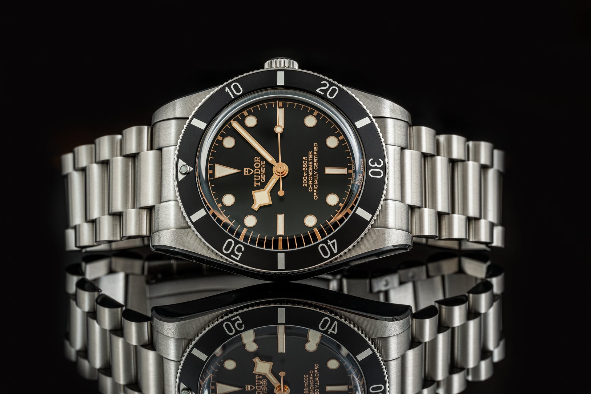 Tudor Black Bay 54 stainless steel diving watch with black dial, gold markers, steel bracelet and rotating bezel