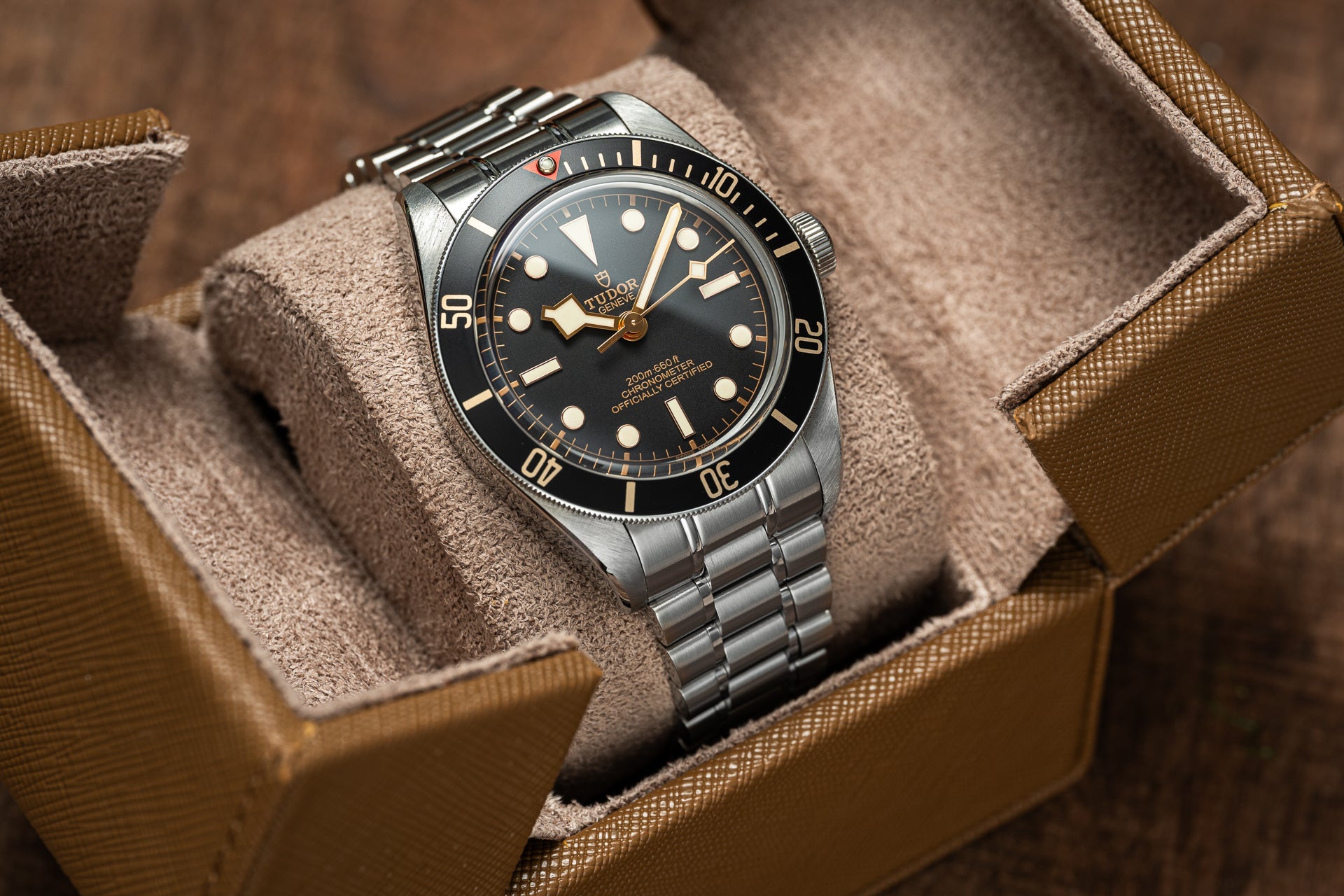 Tudor Black Bay 58 stainless steel dive watch with black dial and beige lume hands in presentation box