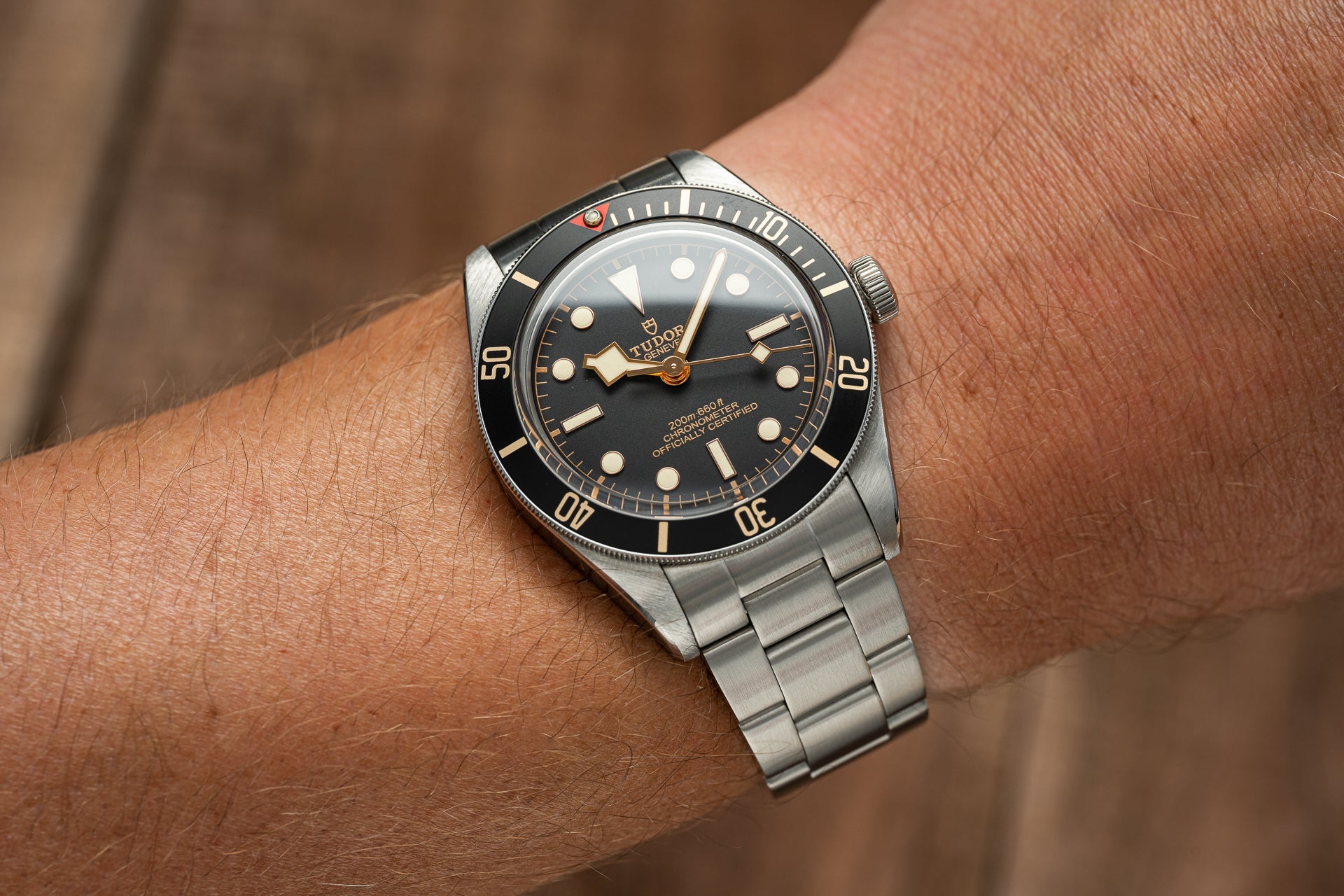 Tudor Black Bay 58 dive watch with stainless steel bracelet and black dial on wrist