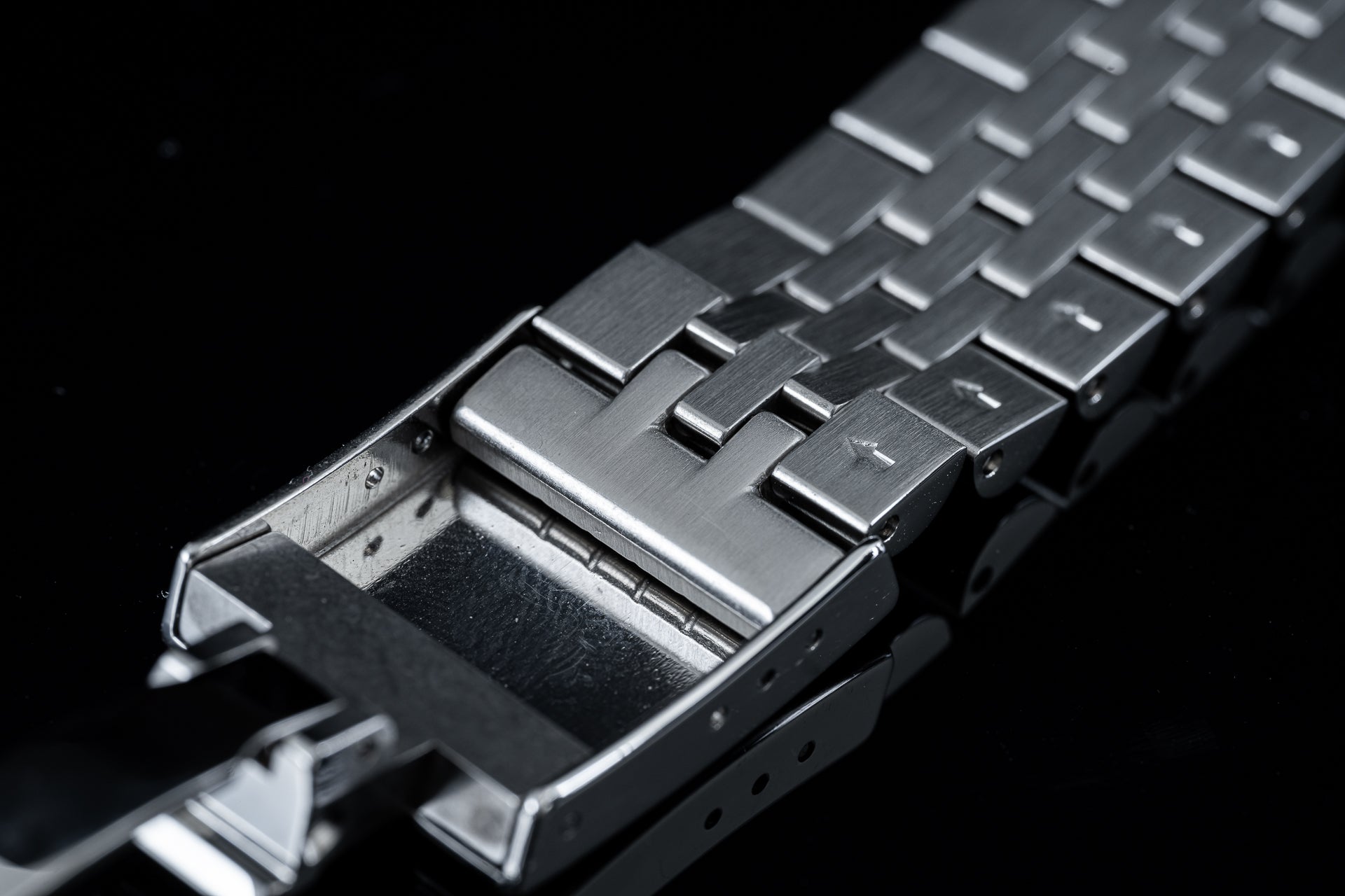 Stainless steel watch bracelet with solid link construction and clasp, compatible with Tudor 41mm models