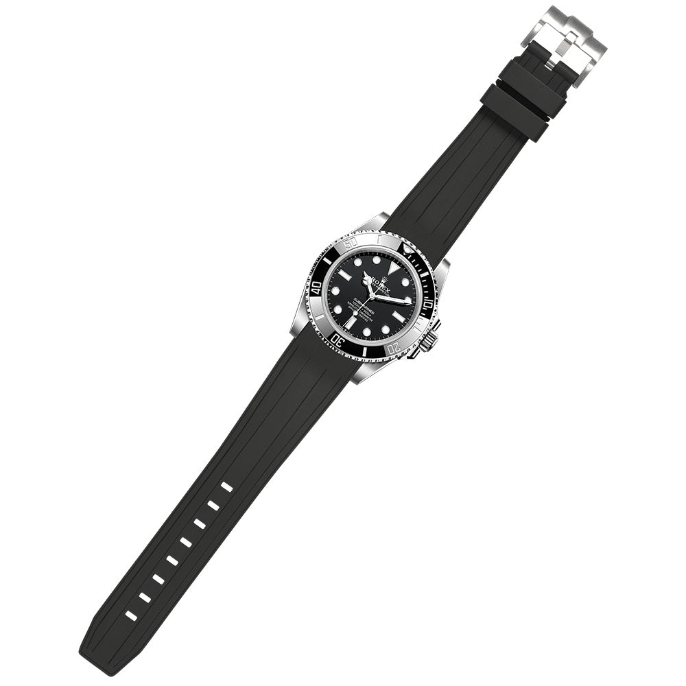Stainless steel Rolex Submariner watch with black dial and rotating bezel on curved black rubber strap
