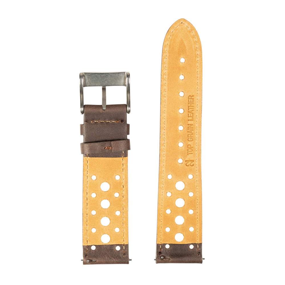 Tan leather quick release watch strap with dark brown racing cuff and perforated holes, shown assembled and disassembled with antique steel buckle