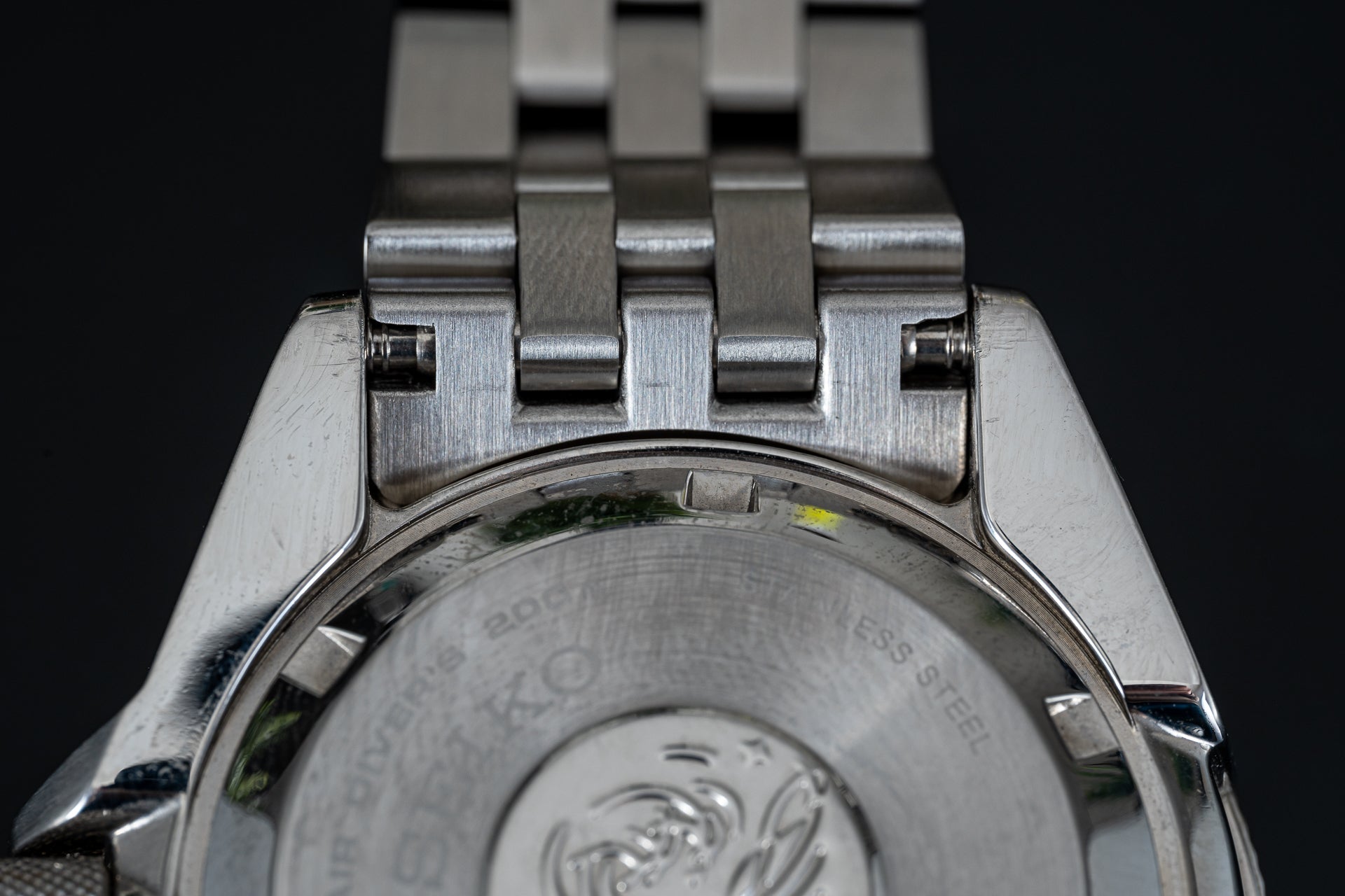 Stainless steel bracelet clasp and links on Seiko Samurai dive watch with brushed metal finish and secure fastening mechanism