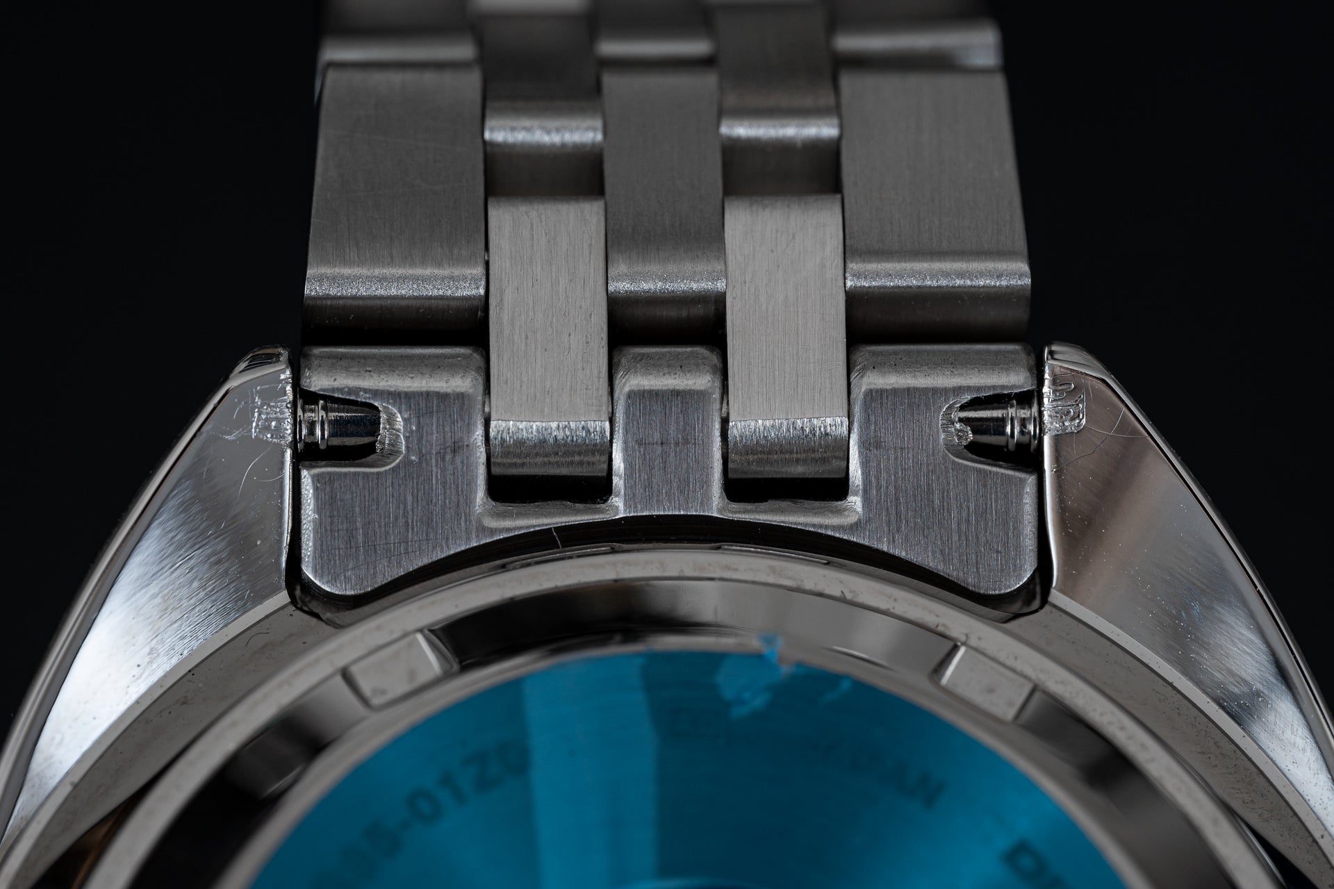 Stainless steel bracelet and lugs on Seiko SPB317 Slim Turtle dive watch with blue dial, overhead detail view