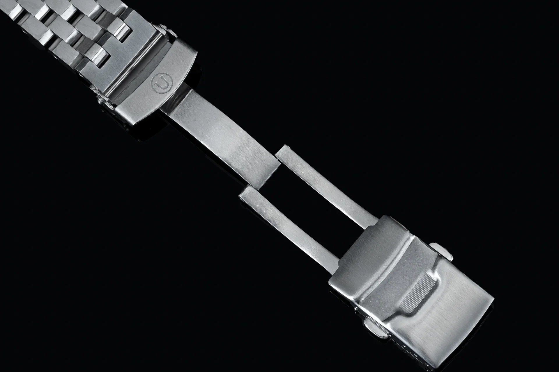 Stainless steel Super Engineer bracelet with solid links and end links for Seiko SPB317 Slim Turtle watch on black background