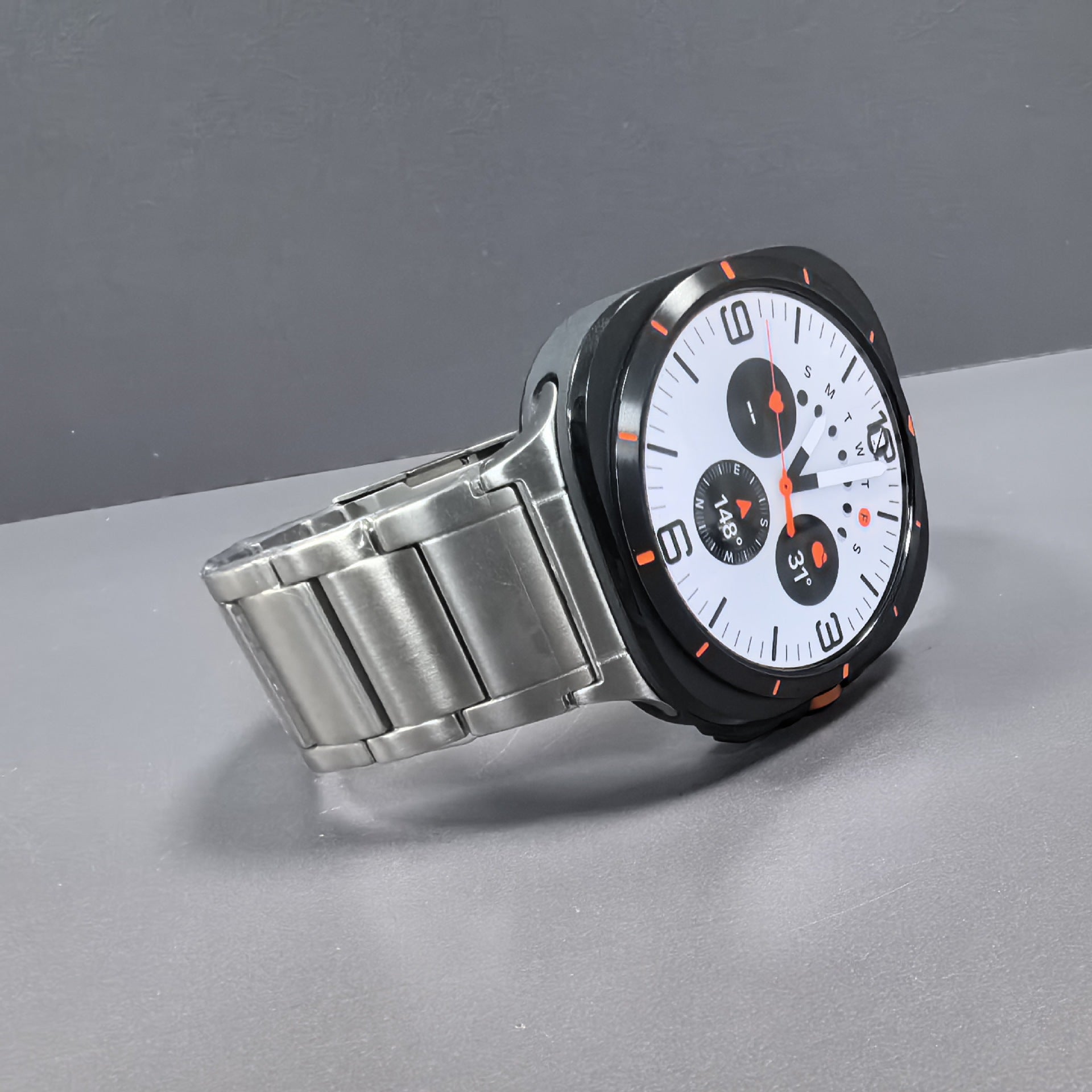 Men's smartwatch with stainless steel bracelet, white chronograph dial, black bezel with orange accents, dual subdials