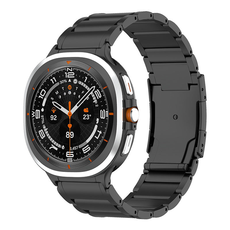 Black titanium smartwatch with orange accents, digital display showing time and health metrics, linked metal bracelet band