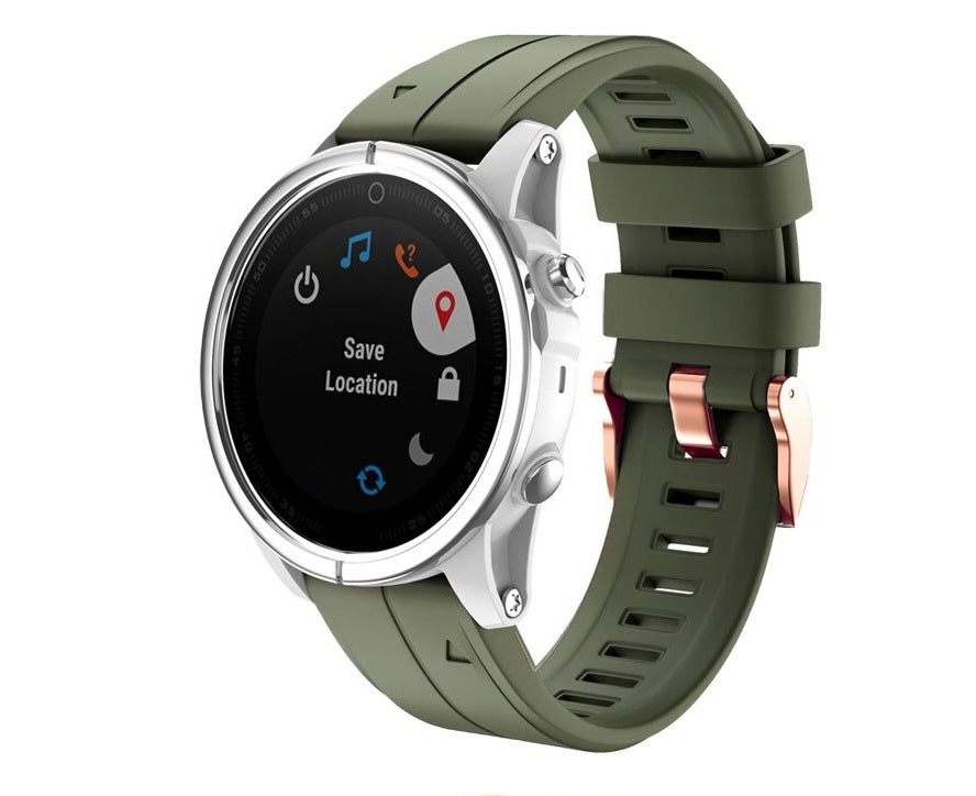 Smartwatch with white case, round black display showing location save feature, olive green silicone band with rose gold hardware and quick-fit strap system