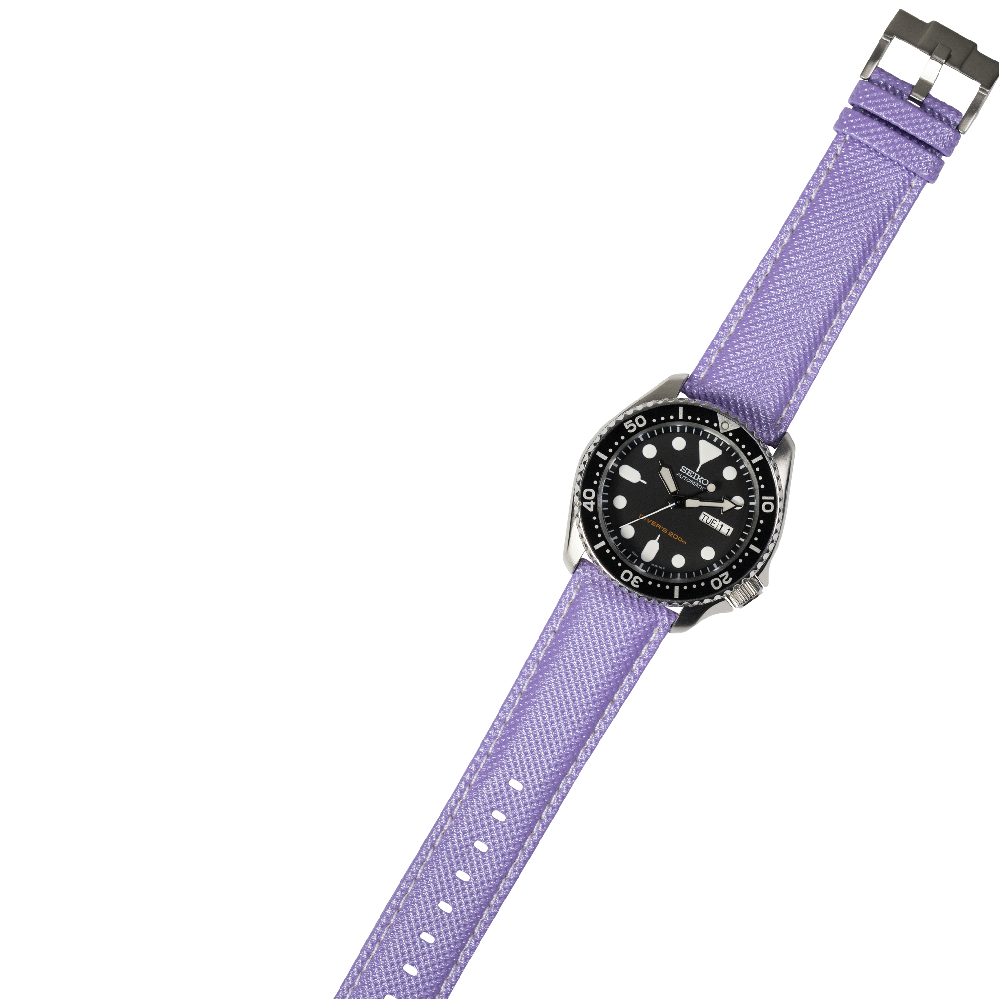 Seiko dive watch with black dial and stainless steel case on purple sailcloth quick-release strap with white stitching