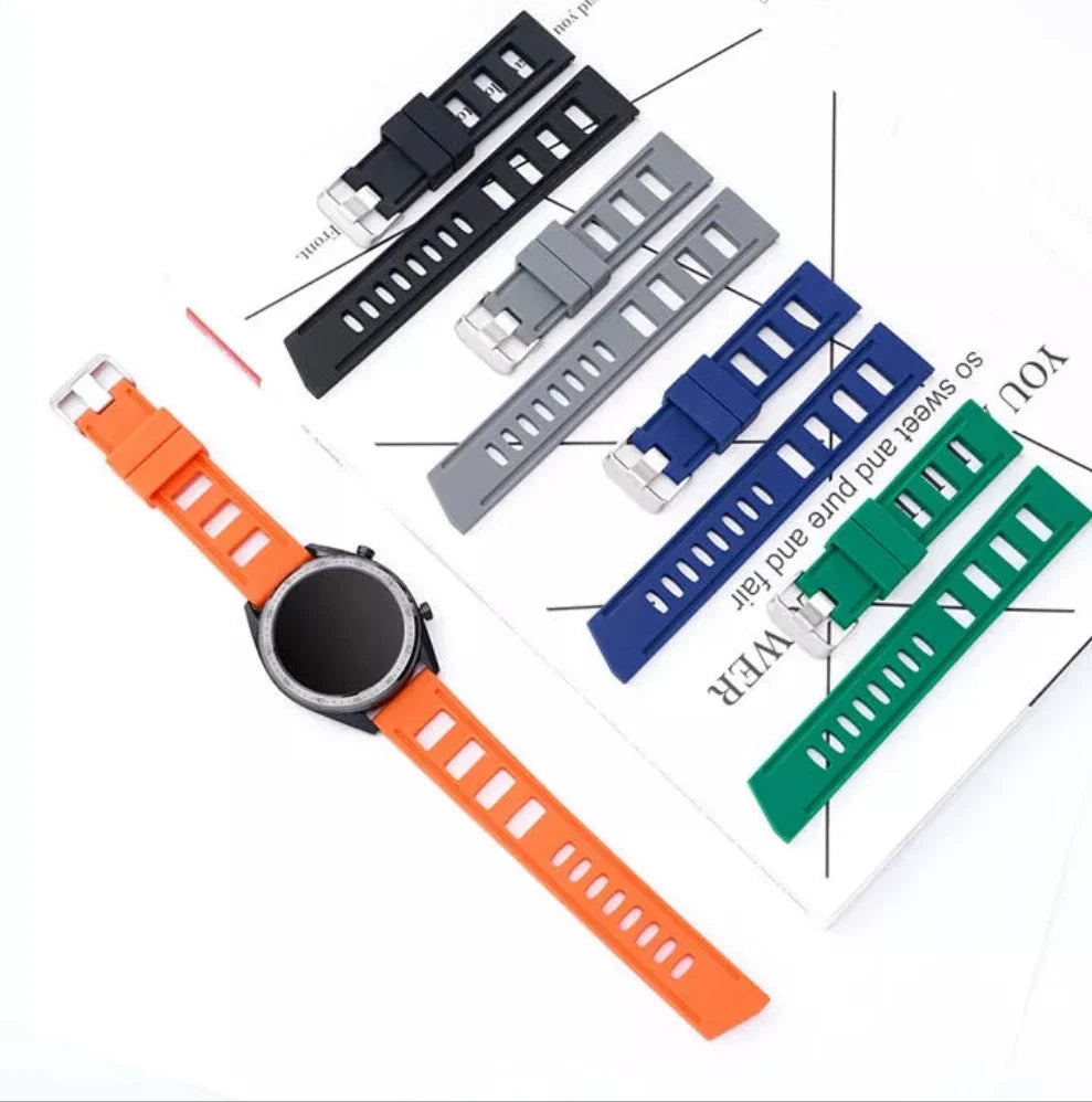 Smartwatch with orange silicone quick release band and assorted color replacement strap options including black, gray, blue, and green bands